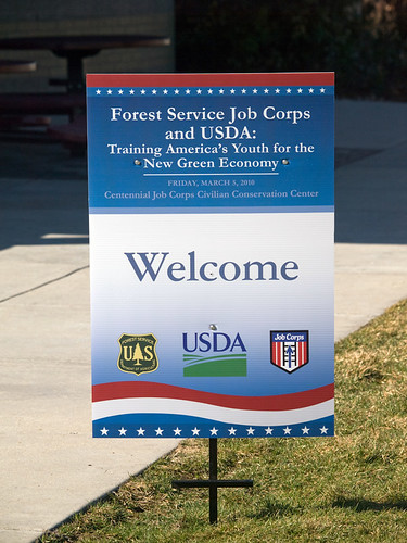 Sign features the design and theme of the event--Forest Service Job Corps and USDA: Training America's Youth for the New Green Economy 