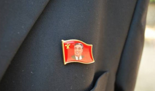 Ubiquitous Kim Jong Il Badges 