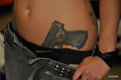 Gun Tattoo Design on Women Belly Written on Dec1410 437am