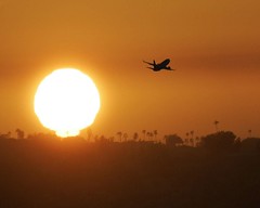 Takeoff from San Diego Airport at sunset 