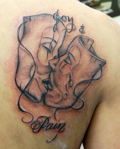 boog joy and pain masks tattoo Tattooed by Johnny at The Tattoo Studio