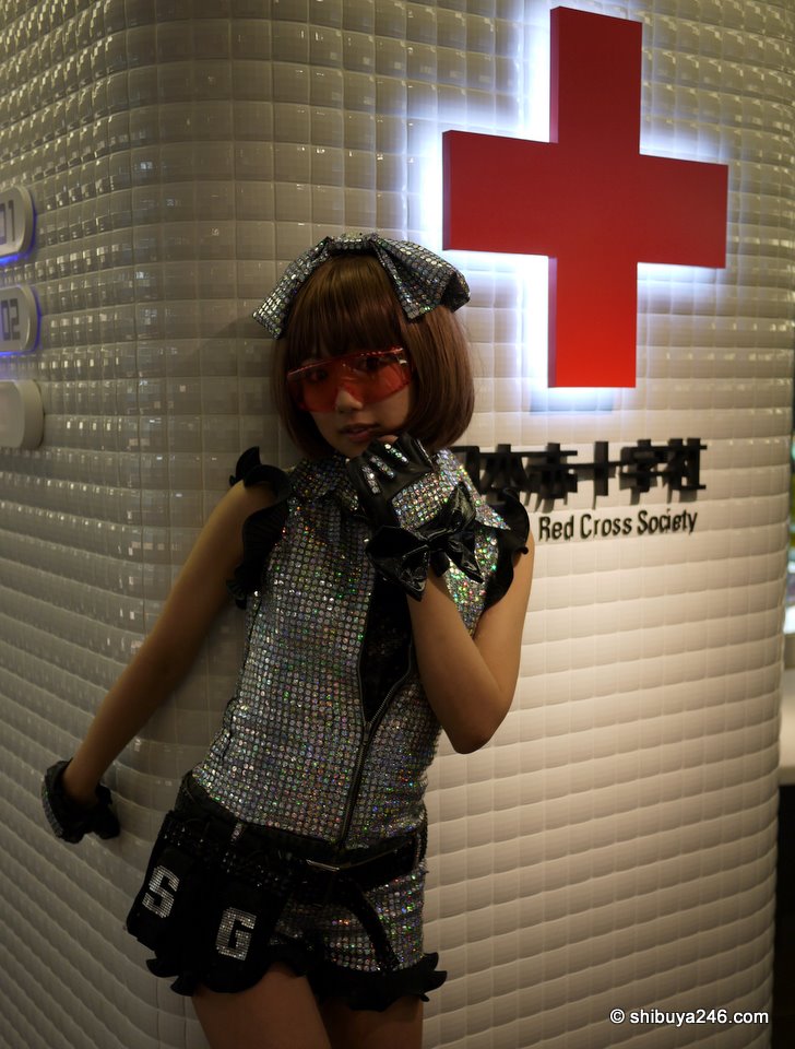 There was no shortage of cameras lining up to take photographs here. The Akiba:F Blood Bank has probably never had so many photos taken of it. This one could be a good promotion piece. Would you come here to give blood if this was the poster girl?