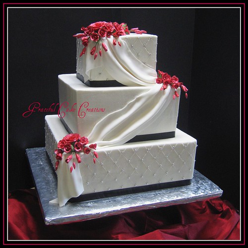 Square Black and White Wedding Cake with Red Roses