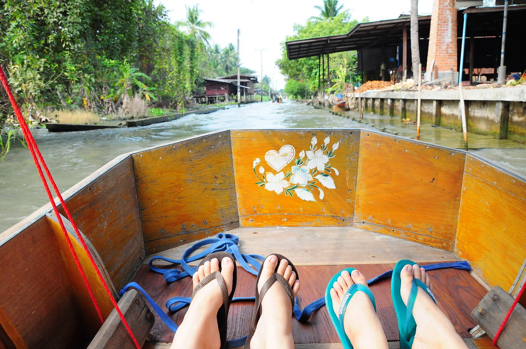 On our little sampan, along the river