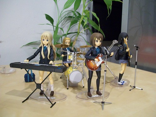 Yui, Mio, Mugi, and Ritsu together.