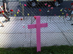 Flowers and pink cross representing the Juárez victims