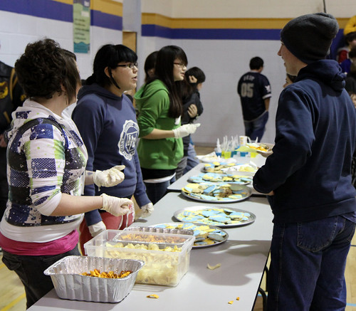 Grade 8 Students check out the tasty treats provided by the Food and Nutrition class.