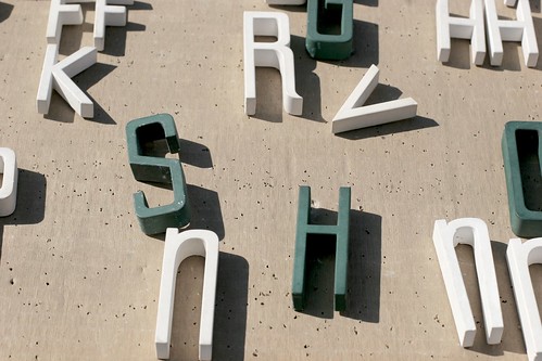 Letters, white and green