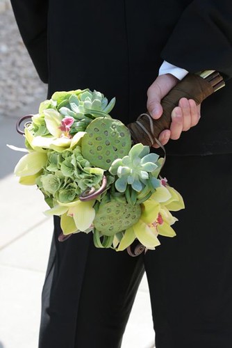 Green bouquet w succulents lotus pods and cymbidiums wedding succulents 