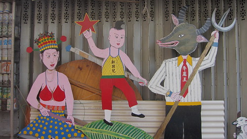 Family grouping with bull-headed dad holding a trident, Tai O, Hong Kong