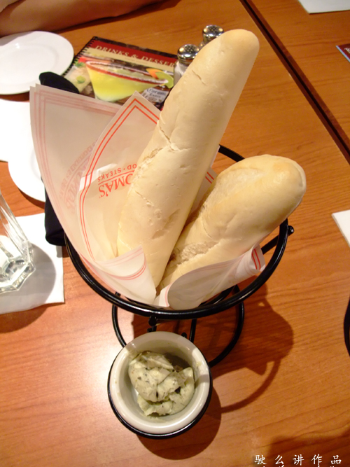 A complimentary breads with herbs butter
