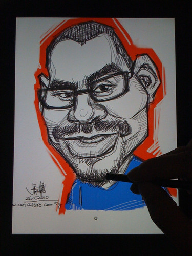 Digital caricature of Rúbel Jesús Mujica León with iPad