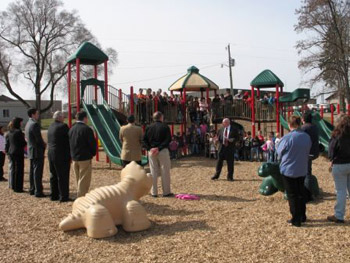 State Director for Michigan James Turner speaks before the new playground at Walkerville