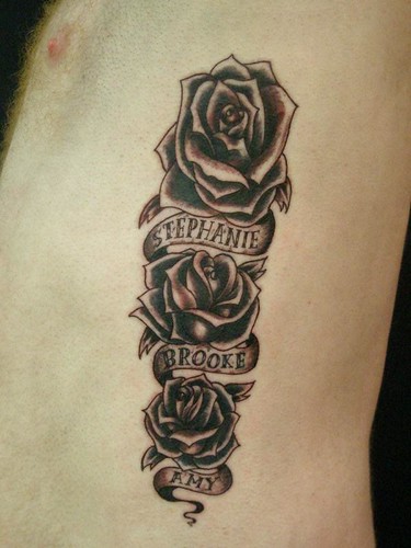 Roses and scroll tattoo Done Heaven