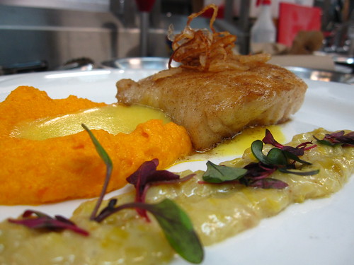 leeks cooked in cream, carrot puree and sauteed cod with a mango pineapple beurre blanc