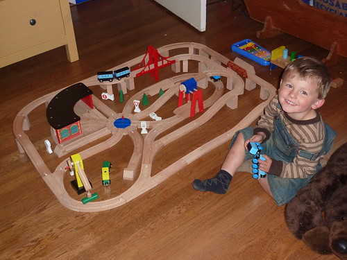 Robin with wooden trains