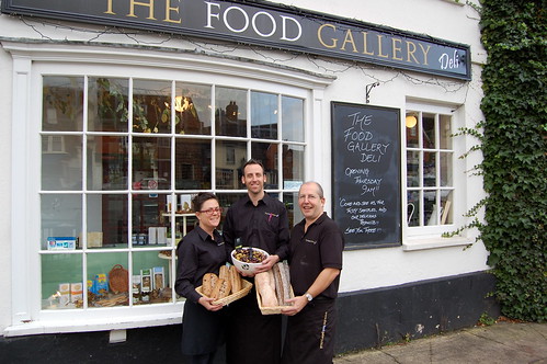 Elaine and Andy Nobbs with Bob Holman at The Food Gallery Deli. 