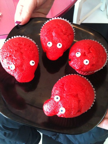 Red velvet cupcakes turned into cupcake characters at New York Cupcakes