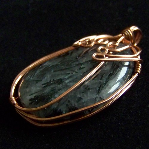 copper and rutilated quartz pendant