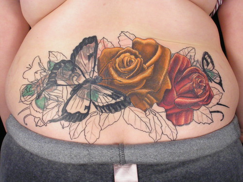  up a before picture. This girl got stuck with a bad lower back tattoo.