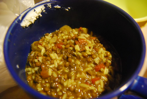 Lentil stew with goat cheese and rice