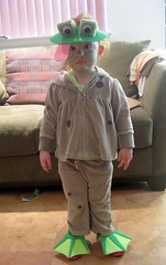 full-length shot of toddler dressed as a frog
