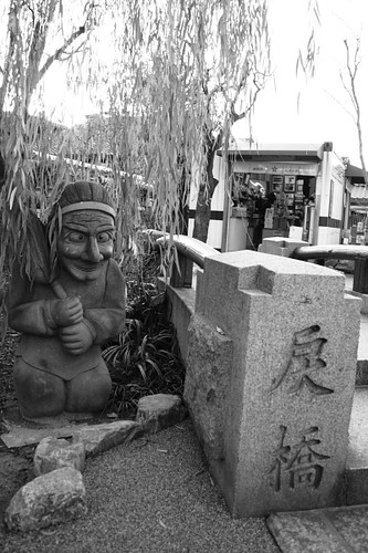 Spirit figure and bridge at Seimei Jinja Shrine