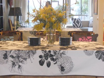 Tablescape with dogwood branches and mimosa flowers
