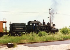 Illinois Railway Museum's Shay locmotive # 5 pulling an eastbound caboose train. Union Illinois. July 1996.