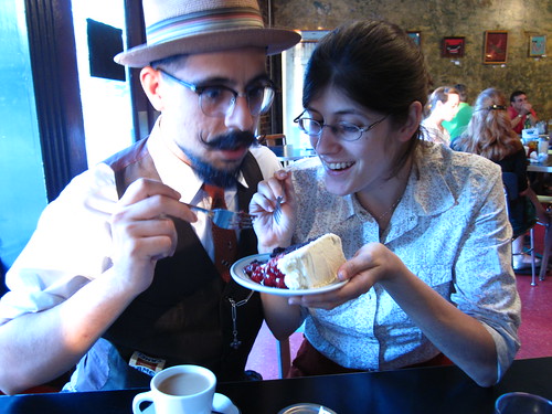 Aitor and Becky having some cake a the Grit.