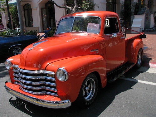 1950 Chevy Truck A Classic Beauty in Orange by trail trekker