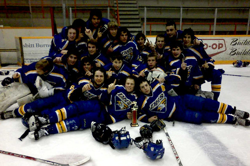 The Boys Eagles Hockey team celebrates winning the A side championship in Winkler this weekend. (submitted photo)