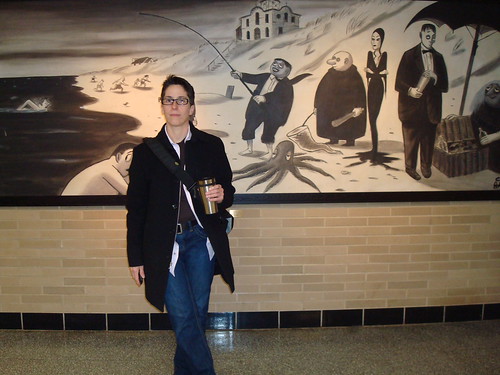 Alison B in front of Charles Addams ptg