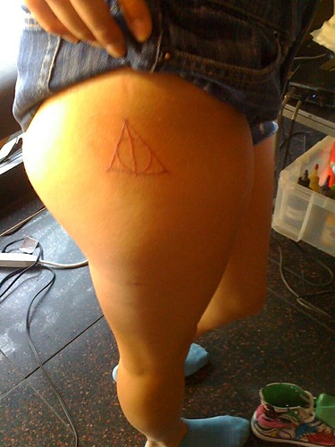 harry potter and deathly hallows symbol. Deathly Hallows symbol in