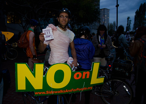 Passing out Pissed Off voter guides - No on L at Halloween Critical Mass 2010