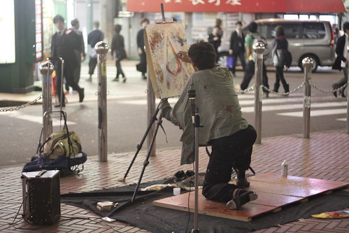 Tap dancing painter Denis paints