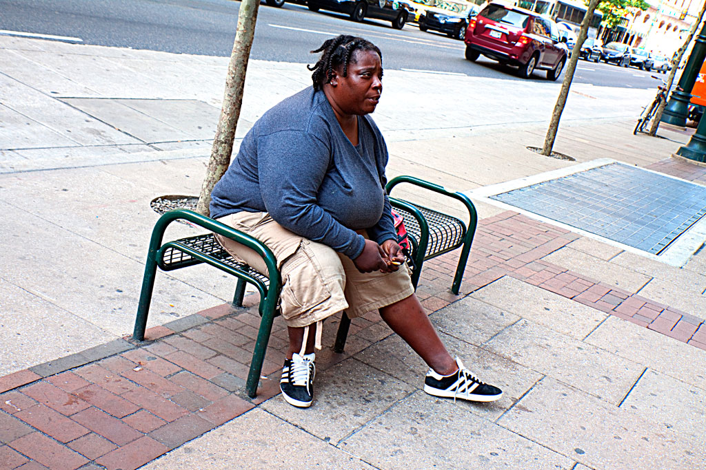 Large-woman-on-bench--Center-City