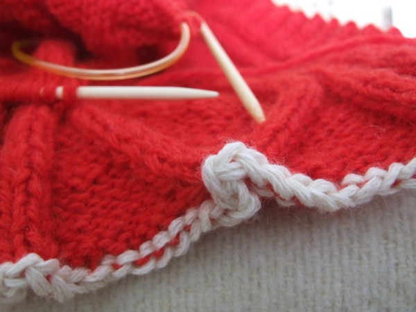 Crochet cast-on in my red cardigan