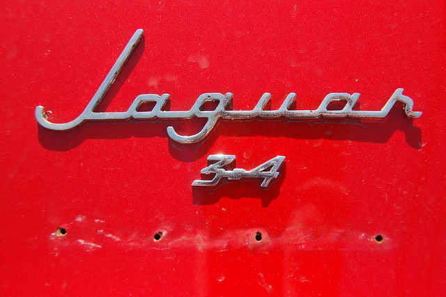 Red Jaguar Mark 1 Chrome badge on the trunkboot lid by Chris Devers