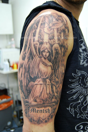 Angel and Dove Tattoo. Tattooed by Ray at The Tattoo Studio, Crayford