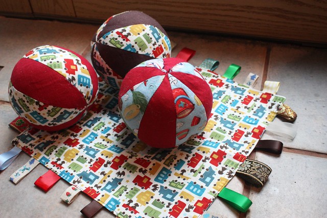 balls and taggie blanket for T
