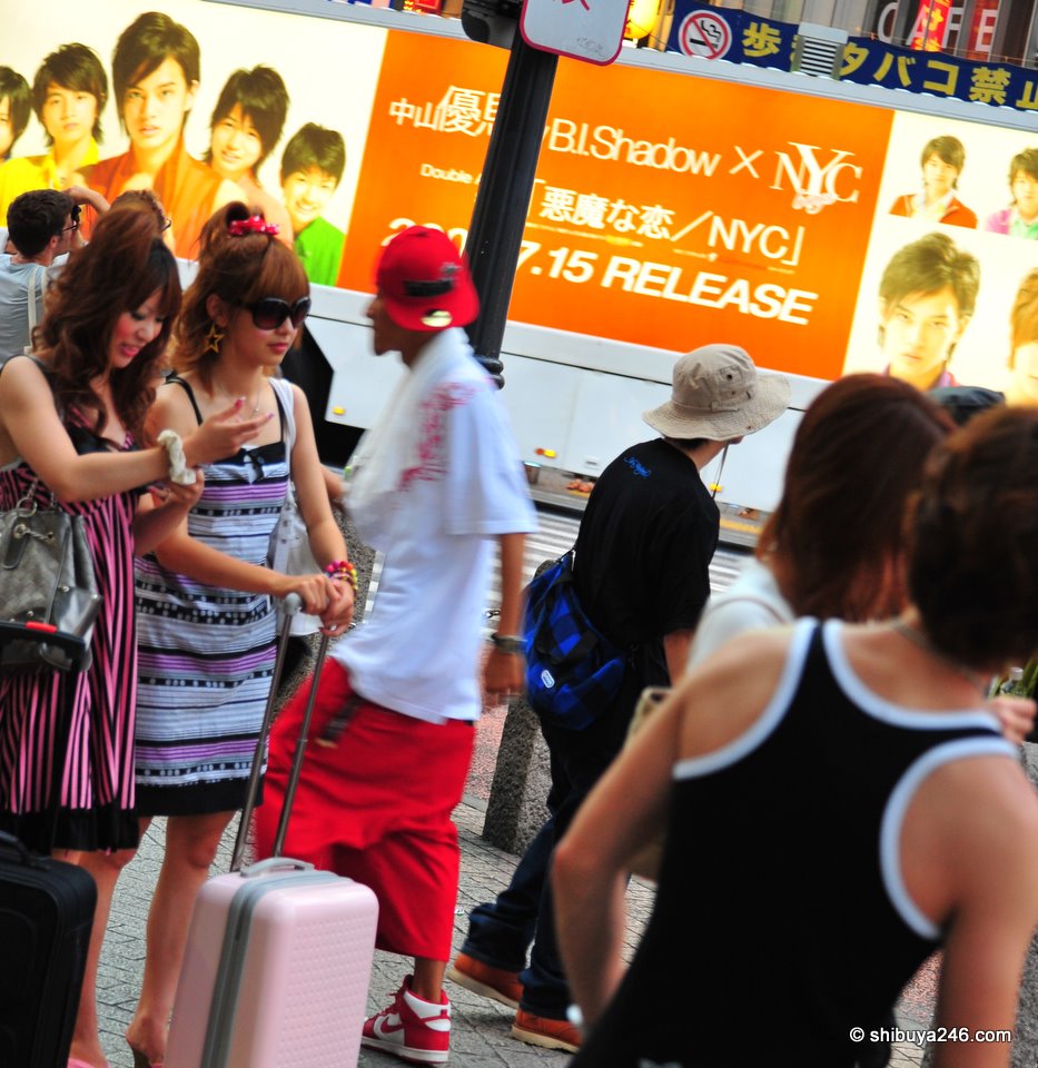 Fashion in the foreground, ads in the background. Lots of action in Shibuya