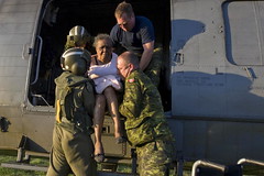 Canadian Soldiers Aid Elderly Haitian at Port-...