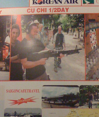 Young tourists firing guns at the Cu Chi Tunnels