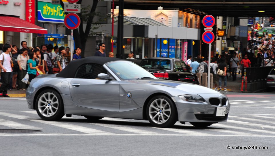 Nice sporty BMW convertible passing through town