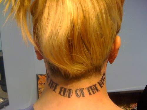 letter tattoos on neck. letter tattoos on back.