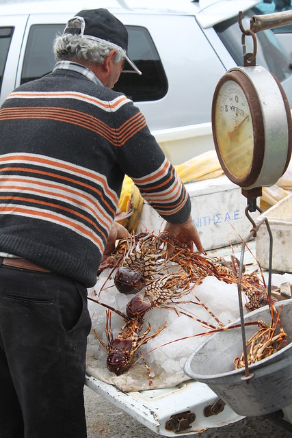 Fisherman selling lobsters