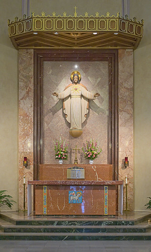 Sacred Heart Roman Catholic Church, in Florissant, Missouri, USA - high altar with Sacred Heart statue and tabernacle