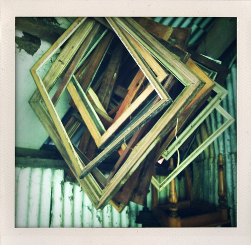 frames hanging in a shed