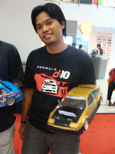 Azri posing with his winning drift car SkyPark Drift King Competition 